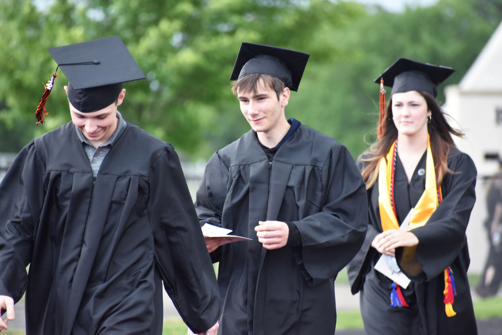 Graduating seniors arrive at Burlington High School for 2022 graduation ceremony